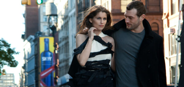 Model Laetitia Casta and male model walking down the street in New York City for L'Oreal Paris Infallible makeup advertising campaign Photo © MODTV