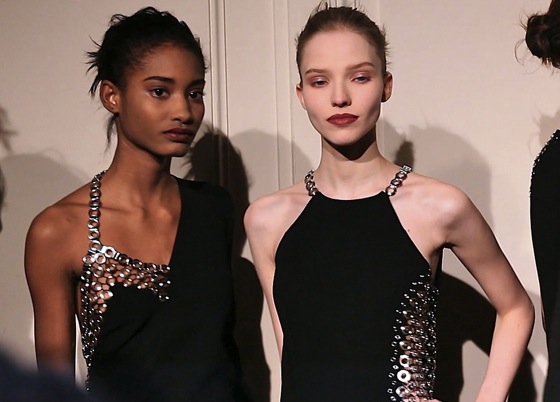 Models wear Sexy black chain link dresses at Anthony Vaccarello Fall 2013